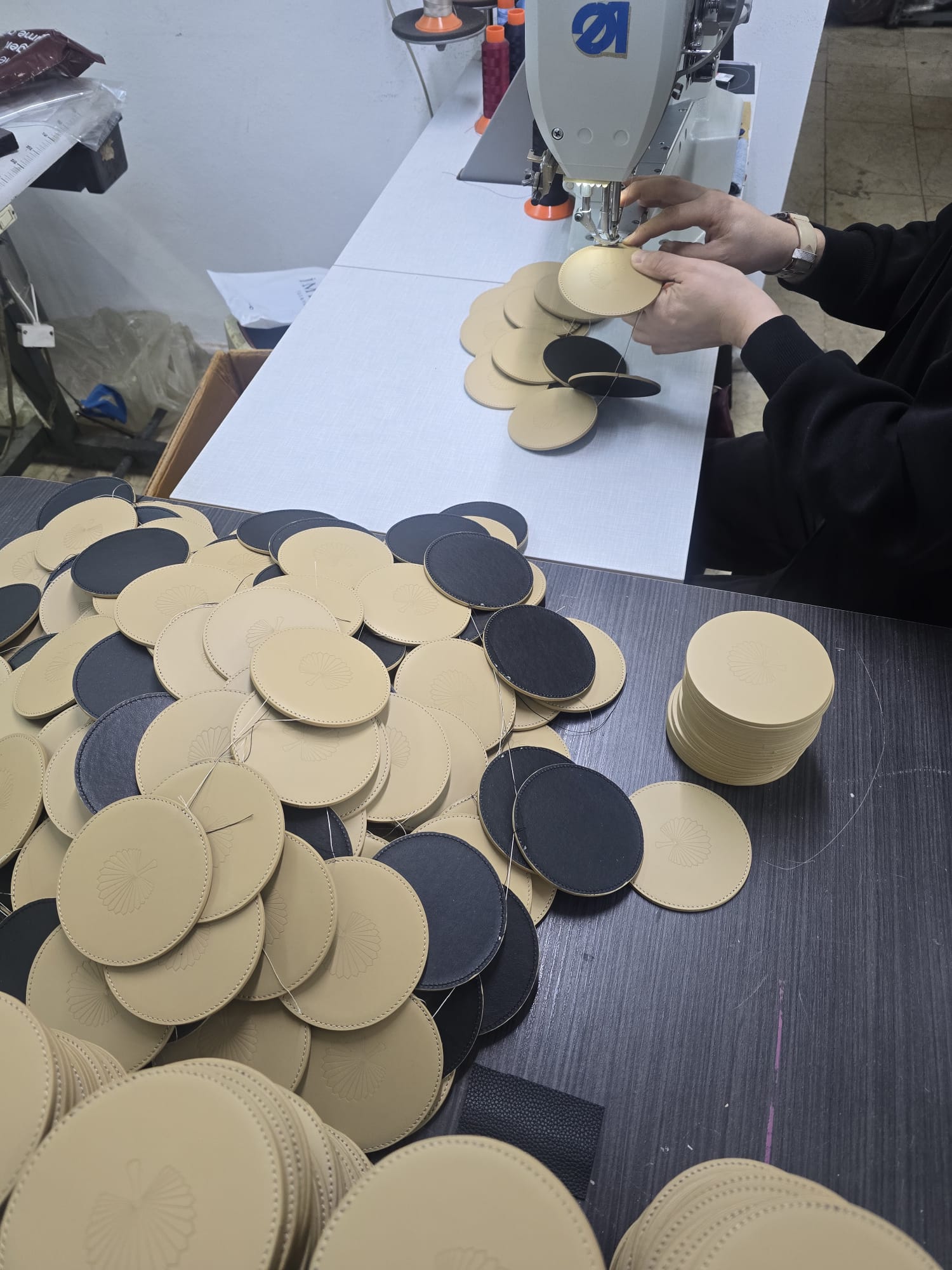 Handcrafted leather coaster production inside Leathera workshop