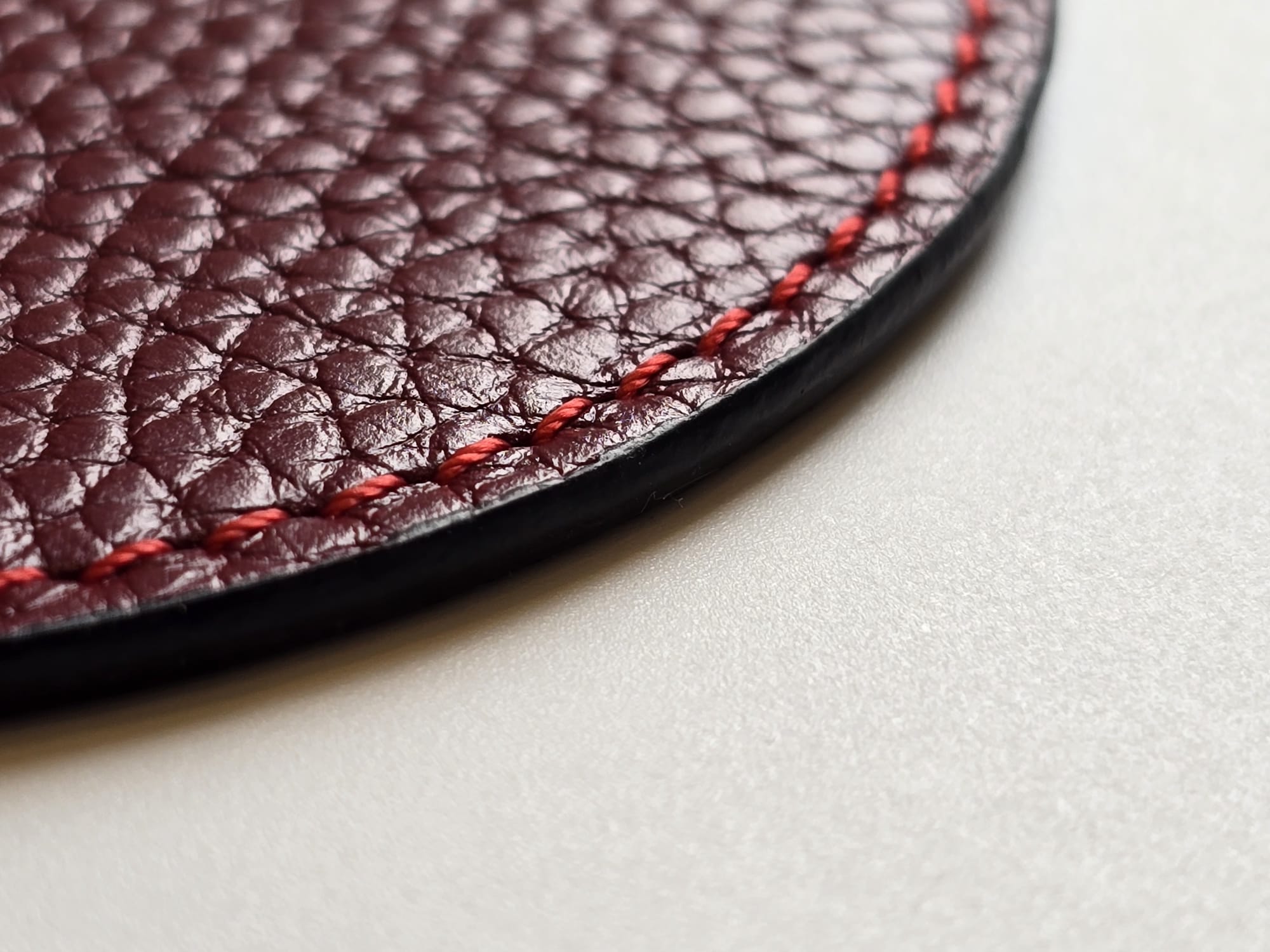 Leather coaster stitching detail