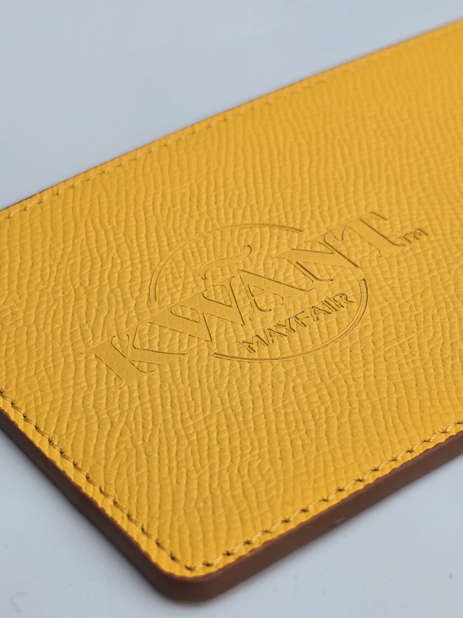 Yellow leather double coaster hospitality